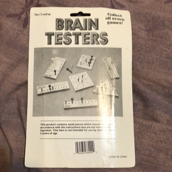 Peg-Out brain teaser game. Fun and challenging. Keep on the coffee table. - Picture 2 of 6